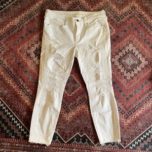 White cropped skinny jeans distressed